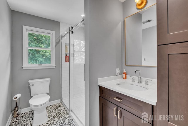 61 Lynn Ct, North Brunswick, NJ 08902 - bathroom with vanity, a stall shower, and tile patterned flooring