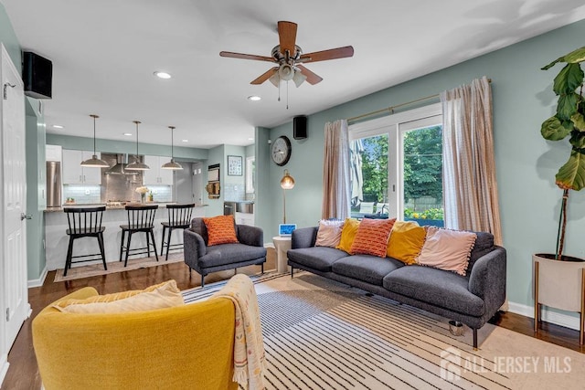 61 Lynn Ct, North Brunswick, NJ 08902 - living room featuring ceiling fan, recessed lighting, and wood finished floors