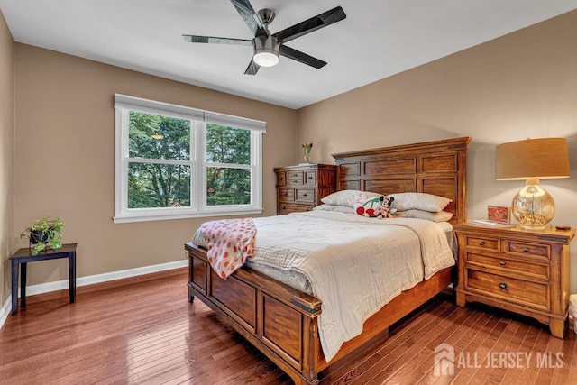 61 Lynn Ct, North Brunswick, NJ 08902 - bedroom with wood finished floors and a ceiling fan