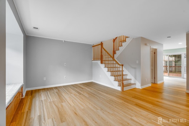 1604 Mulberry Ct, South Brunswick, NJ 08852 - unfurnished living room featuring light wood-style flooring and stairs