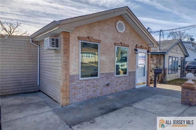 604 Greenwood Ave, Old Bridge, NJ 08879 - view of front of house featuring a wall mounted air conditioner