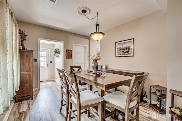97 Boehmhurst Ave, Sayreville, NJ 08872 - dining room featuring baseboards and light wood finished floors