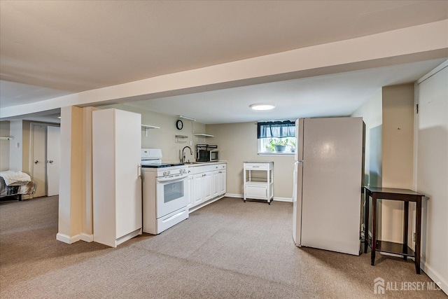 97 Boehmhurst Ave, Sayreville, NJ 08872 - kitchen featuring white appliances, light carpet, and white cabinetry