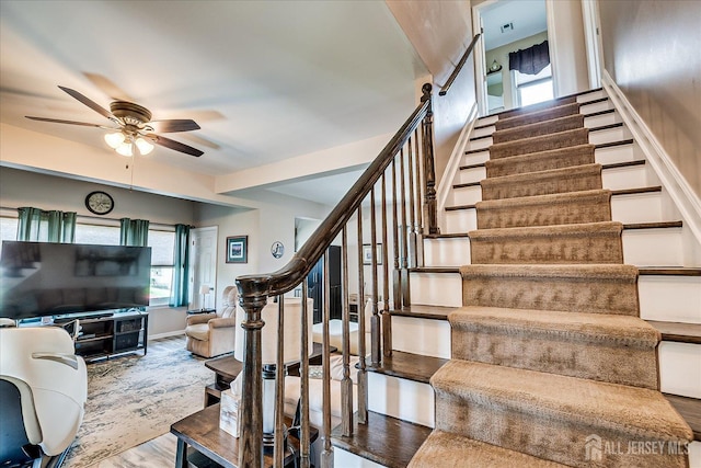 97 Boehmhurst Ave, Sayreville, NJ 08872 - stairway with a ceiling fan, plenty of natural light, and wood finished floors
