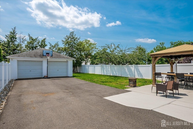 97 Boehmhurst Ave, Sayreville, NJ 08872 - view of patio featuring a gazebo, an outdoor structure, a detached garage, and outdoor dining space