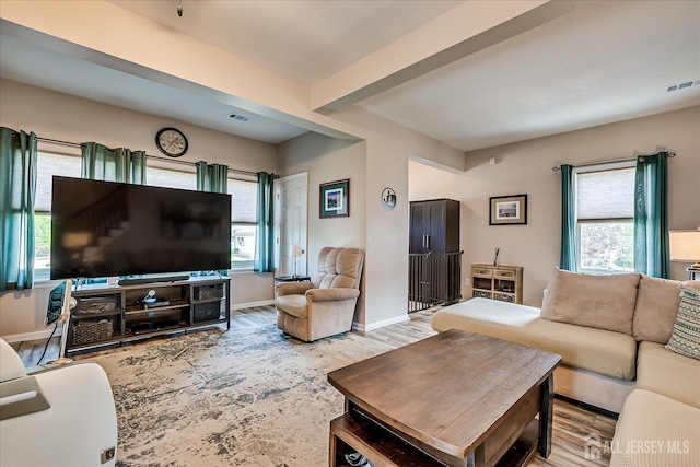 97 Boehmhurst Ave, Sayreville, NJ 08872 - living room featuring healthy amount of natural light and wood finished floors
