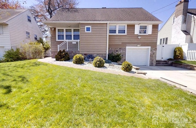 45 Maryknoll Rd, Menlo Park Terrace, NJ 08840 - view of front of home with stone siding, driveway, and an attached garage