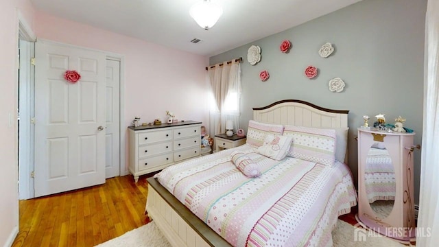 45 Maryknoll Rd, Menlo Park Terrace, NJ 08840 - bedroom with light wood-style floors