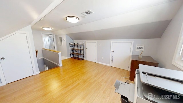 45 Maryknoll Rd, Menlo Park Terrace, NJ 08840 - additional living space featuring wood finished floors, lofted ceiling, and baseboards