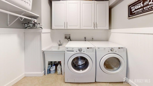 45 Maryknoll Rd, Menlo Park Terrace, NJ 08840 - laundry area featuring cabinet space, washer and dryer, and baseboards