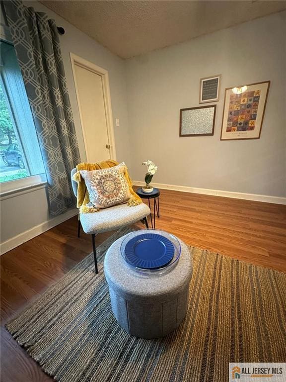 134 Hampshire Dr, Plainsboro, NJ 08536 - living area with wood finished floors and a textured ceiling