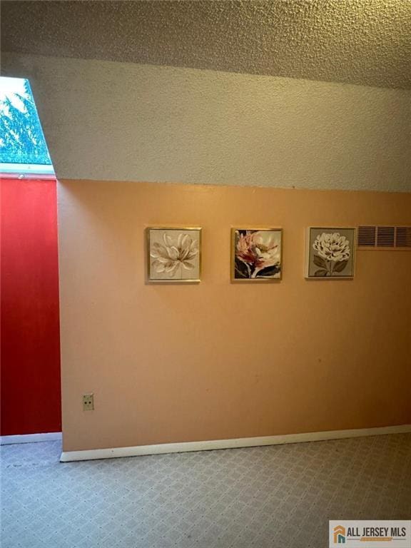 134 Hampshire Dr, Plainsboro, NJ 08536 - detailed view of carpet flooring and a textured ceiling