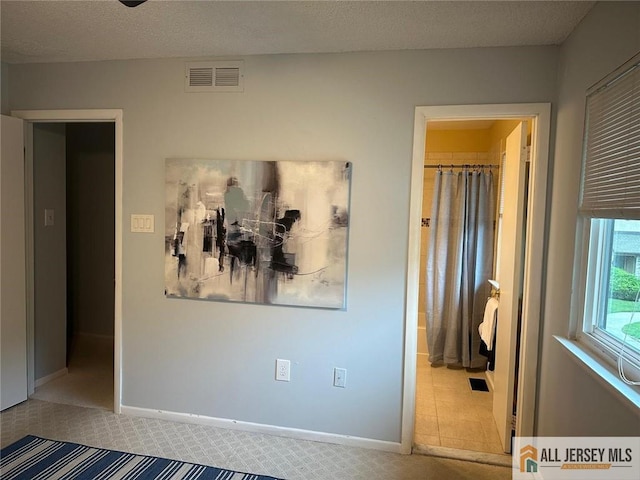134 Hampshire Dr, Plainsboro, NJ 08536 - carpeted bedroom featuring baseboards and a textured ceiling