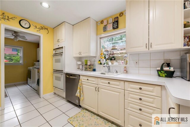 14 Devon Rd, Edison, NJ 08820 - kitchen with dishwasher, double oven, healthy amount of natural light, light countertops, and recessed lighting