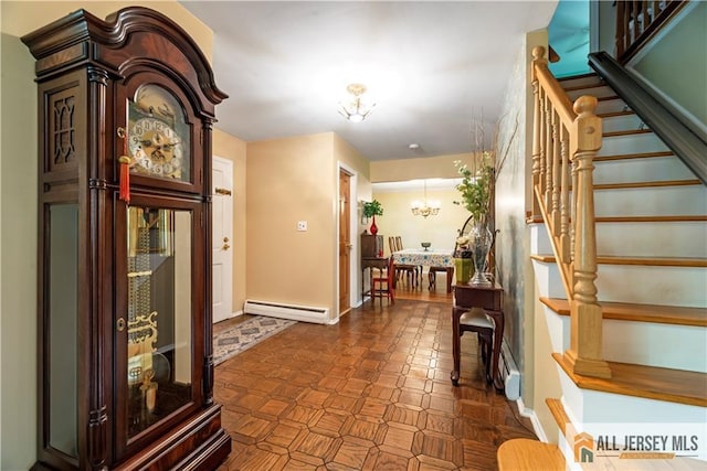 14 Devon Rd, Edison, NJ 08820 - entrance foyer with a baseboard radiator, a chandelier, and stairway
