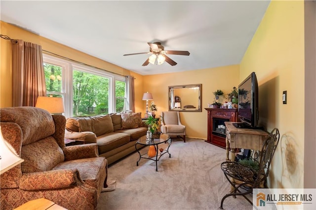 14 Devon Rd, Edison, NJ 08820 - living room with a ceiling fan and light carpet