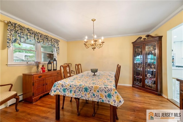 14 Devon Rd, Edison, NJ 08820 - dining room featuring a chandelier, ornamental molding, and wood finished floors