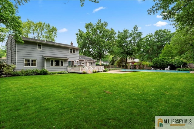 14 Devon Rd, Edison, NJ 08820 - view of yard featuring a wooden deck and a pool
