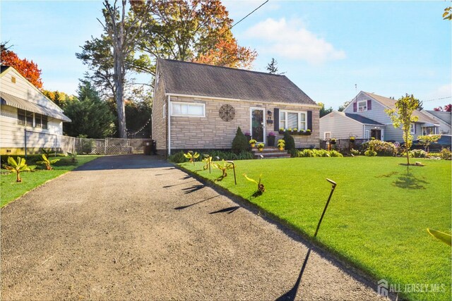 view of front of home with a front yard