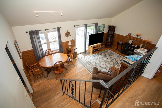 22 Woodcrest Dr, Old Bridge, NJ 08857 - living area with wood finished floors, lofted ceiling, and rail lighting
