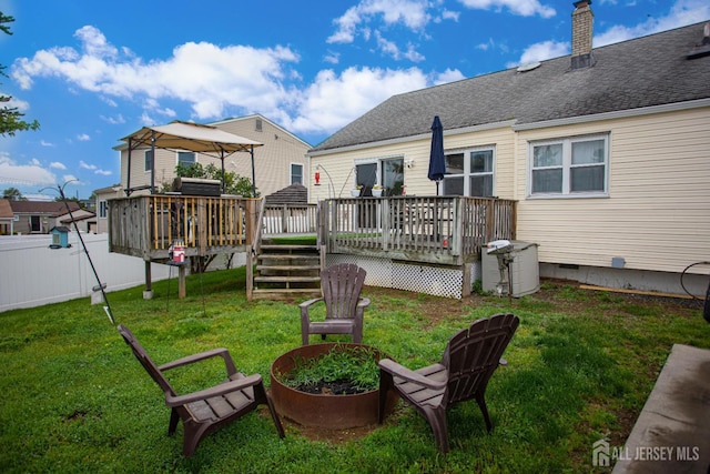 22 Woodcrest Dr, Old Bridge, NJ 08857 - view of yard featuring a wooden deck