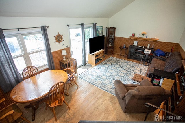 22 Woodcrest Dr, Old Bridge, NJ 08857 - living room with vaulted ceiling, wood finished floors, and wainscoting