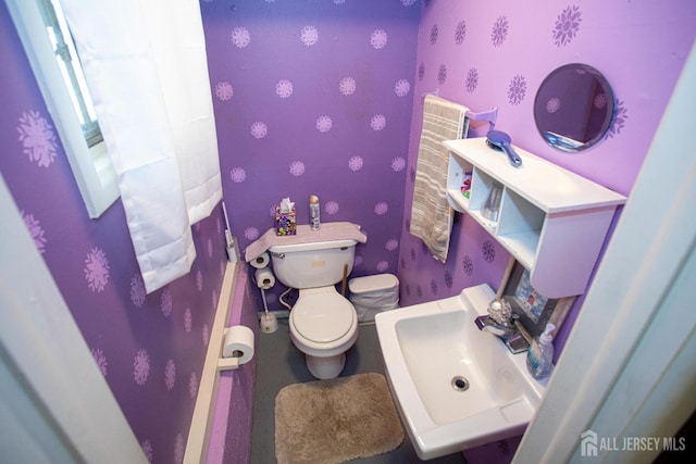 22 Woodcrest Dr, Old Bridge, NJ 08857 - bathroom featuring toilet and wallpapered walls