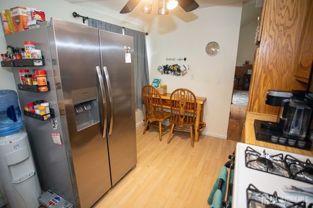 22 Woodcrest Dr, Old Bridge, NJ 08857 - kitchen with stainless steel fridge, ceiling fan, light wood-type flooring, and white gas range