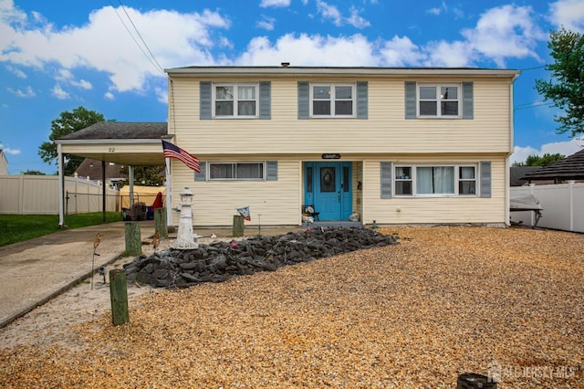 22 Woodcrest Dr, Old Bridge, NJ 08857 - colonial home featuring an attached carport and concrete driveway