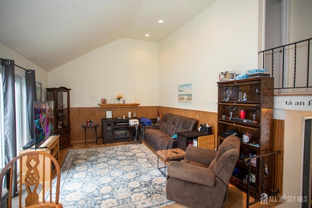 22 Woodcrest Dr, Old Bridge, NJ 08857 - living area featuring a wainscoted wall, lofted ceiling, recessed lighting, wooden walls, and wood finished floors