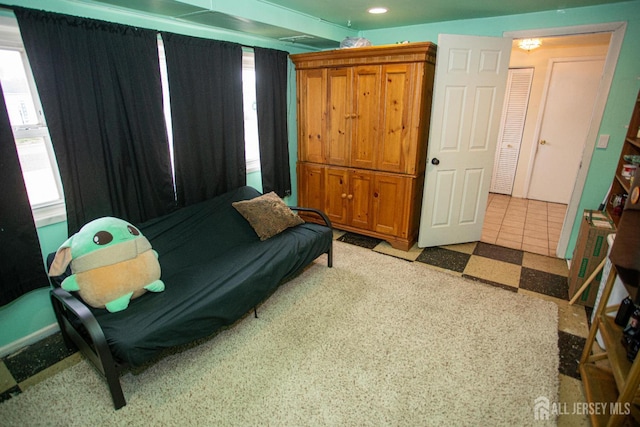 22 Woodcrest Dr, Old Bridge, NJ 08857 - sitting room with healthy amount of natural light, tile patterned floors, and recessed lighting