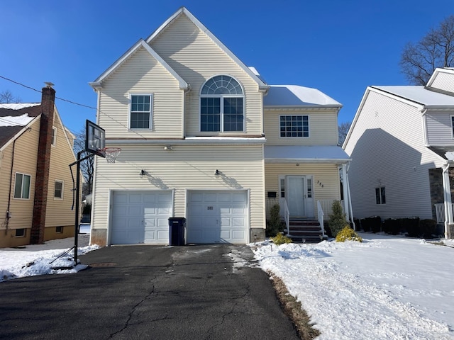 view of front property with a garage