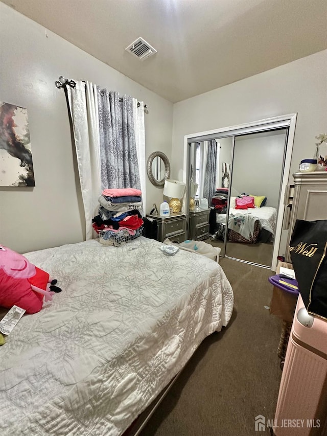 428 Broadhead Pl, Perth Amboy, NJ 08861 - carpeted bedroom featuring a closet