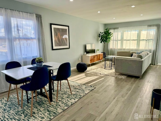 dining room featuring light hardwood / wood-style flooring