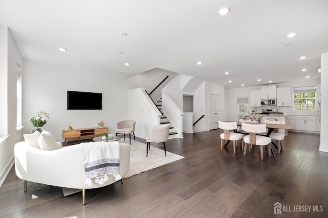 1617 Swales Ct, Monroe, NJ 08831 - living room featuring stairs, dark wood finished floors, recessed lighting, and baseboards