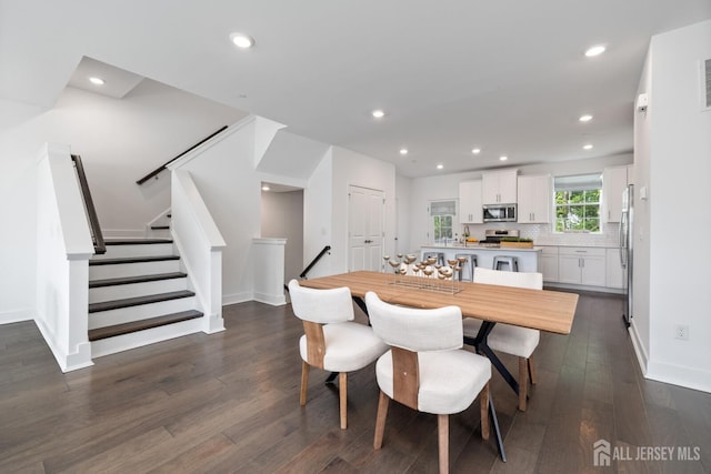 1617 Swales Ct, Monroe, NJ 08831 - dining space with dark wood-style floors, recessed lighting, baseboards, and stairs