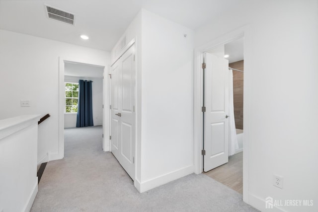 1617 Swales Ct, Monroe, NJ 08831 - hall featuring light carpet, baseboards, and recessed lighting