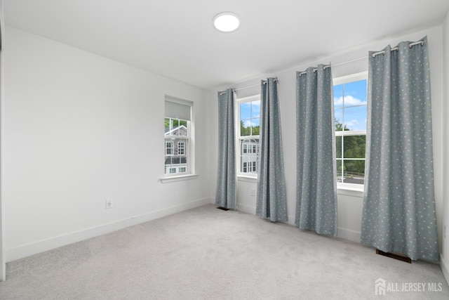 1617 Swales Ct, Monroe, NJ 08831 - spare room featuring carpet and baseboards