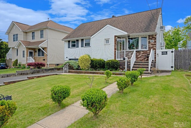 view of front of house with a front lawn