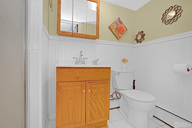 bathroom with toilet, tile patterned flooring, an enclosed shower, and a baseboard heating unit