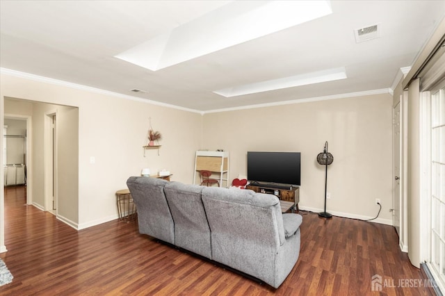 living room featuring dark hardwood / wood-style flooring, crown molding, and a skylight