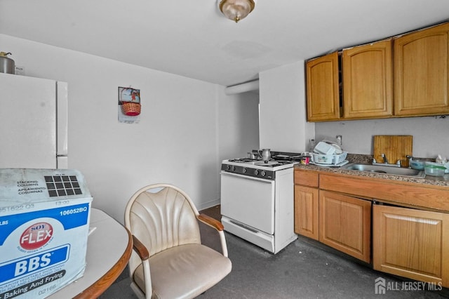 184 Seaman St, New Brunswick, NJ 08901 - kitchen featuring white appliances and brown cabinets