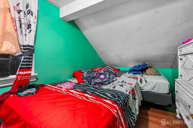 184 Seaman St, New Brunswick, NJ 08901 - bedroom featuring vaulted ceiling and wood finished floors