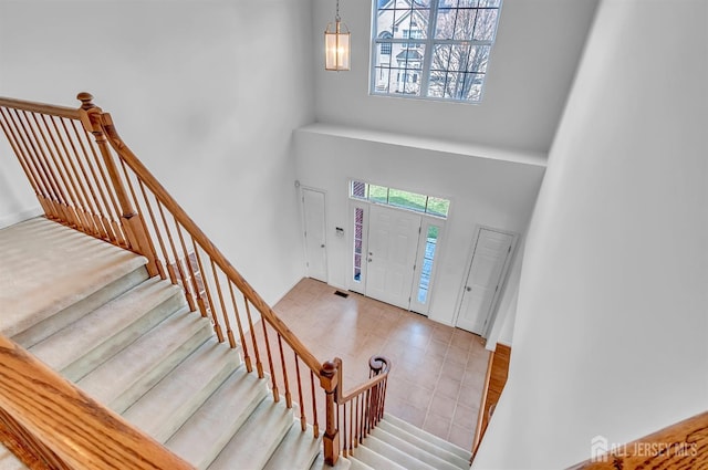 57 Cortland Dr N, East Brunswick, NJ 08816 - foyer entrance featuring a towering ceiling and stairs