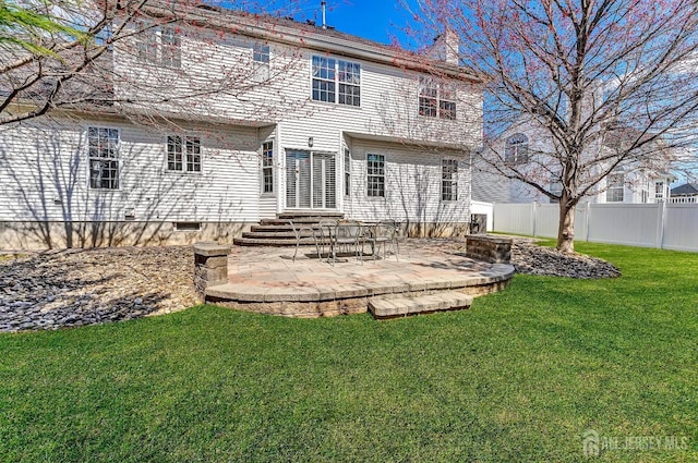 57 Cortland Dr N, East Brunswick, NJ 08816 - back of house featuring a yard, entry steps, a patio, and a fenced backyard
