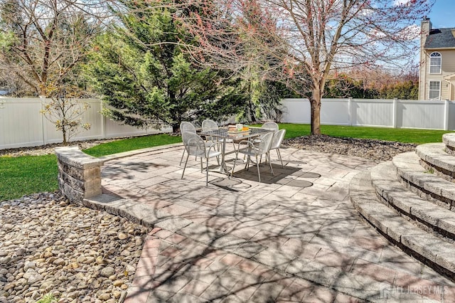57 Cortland Dr N, East Brunswick, NJ 08816 - view of patio featuring outdoor dining space and a fenced backyard