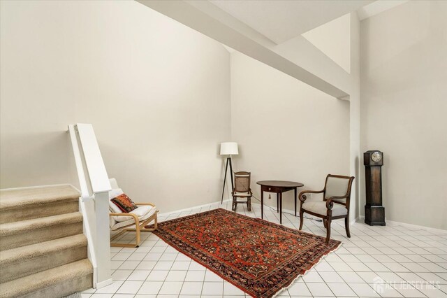 sitting room featuring light tile patterned floors