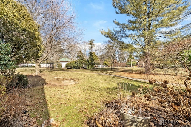 view of yard with fence