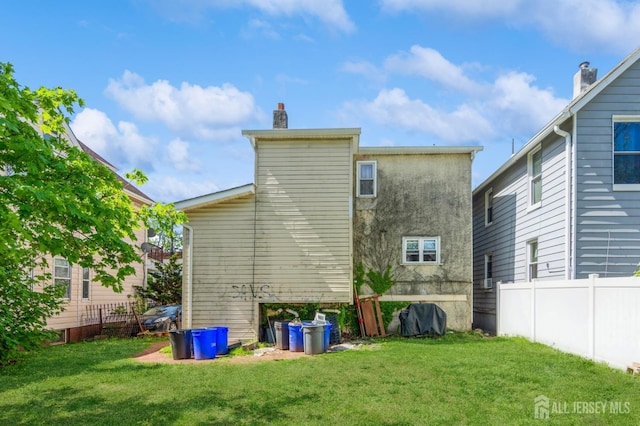 185 Redmond St, New Brunswick, NJ 08901 - rear view of house with a chimney