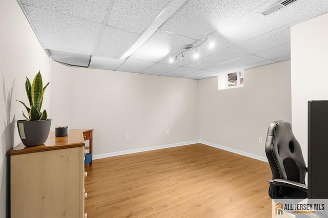 3 Eric Ct, Monroe, NJ 08831 - unfurnished office with light wood-style flooring, a paneled ceiling, and baseboards